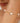 Gold bracelet with pearls on a wrist