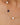 Necklace with pearls and a blue gemstone on a woman's neck