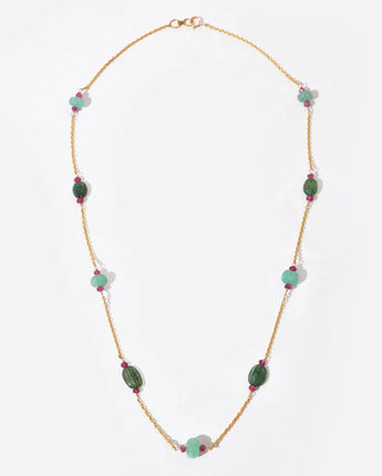 Necklace with green and pink beads on a white background