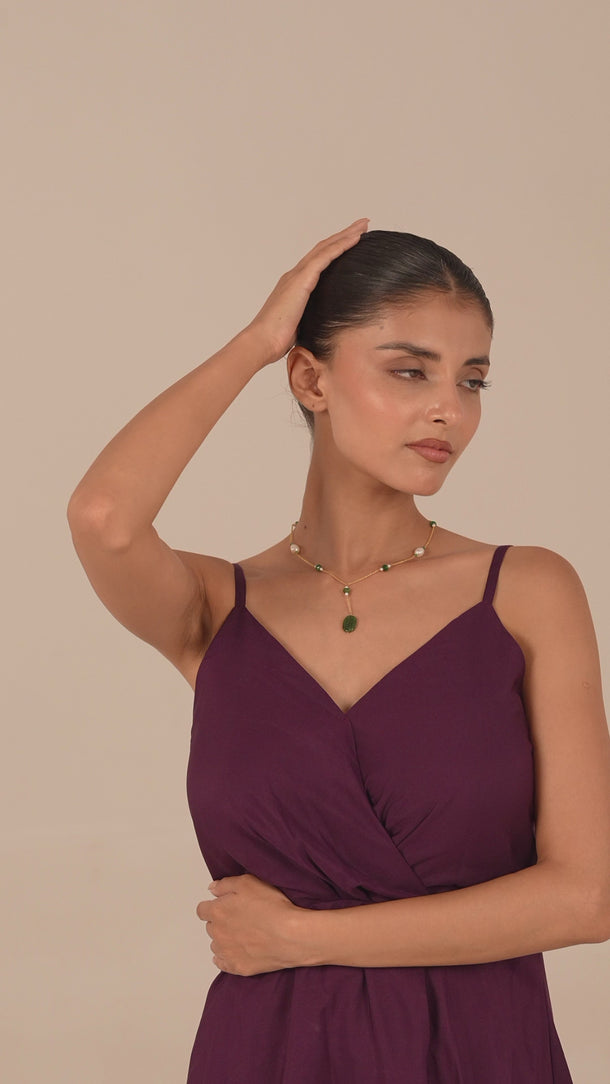 Women wearing a beautiful gemstone necklace 