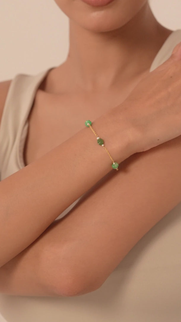 14K Gold Bracelet with green gemstones